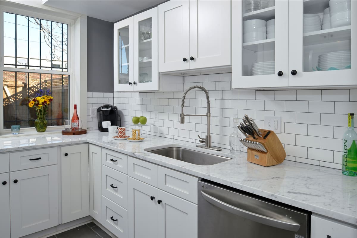 Classic White Kitchen Remodel — Karma Construction Group
