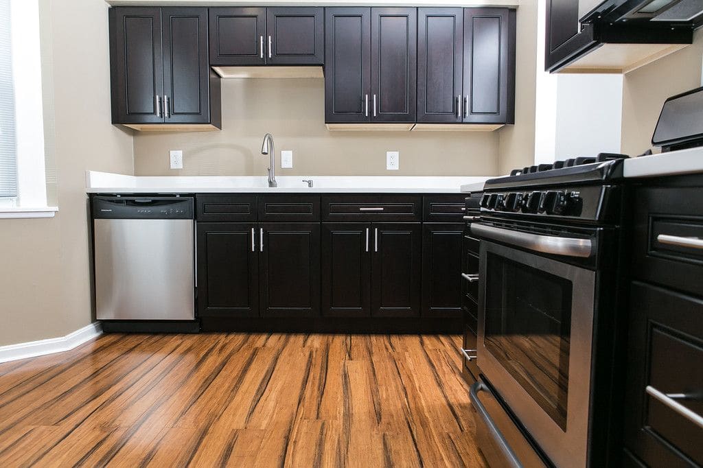 Espresso & Quartz Kitchen Remodel — Karma Construction Group