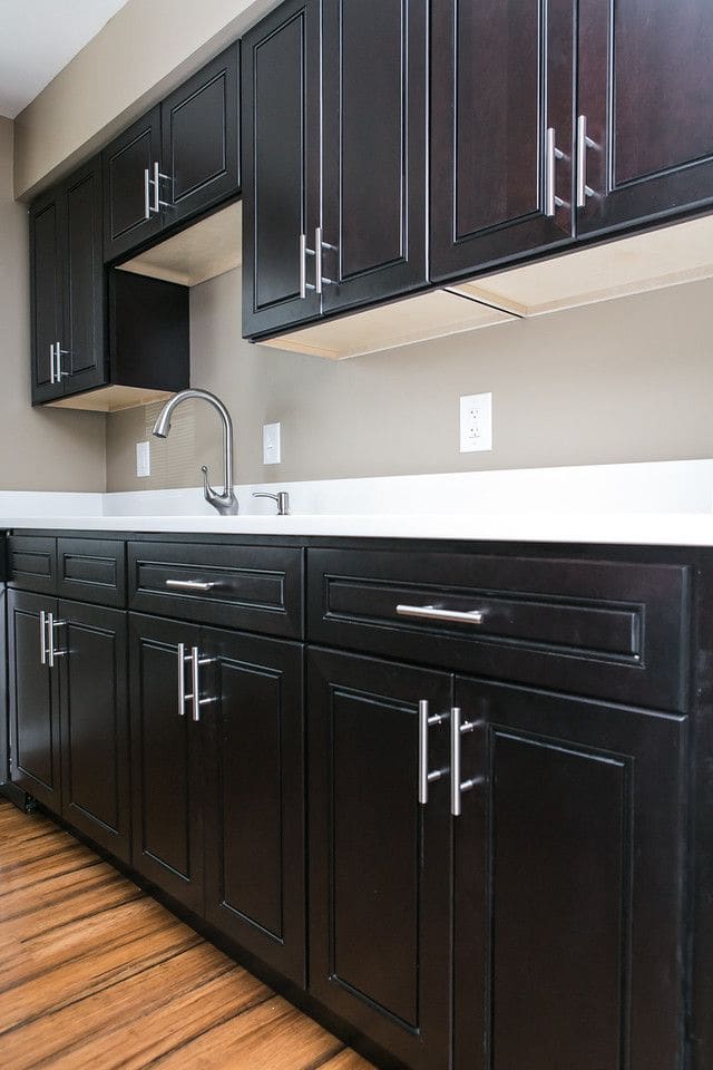 Espresso & Quartz Kitchen Remodel — Karma Construction Group