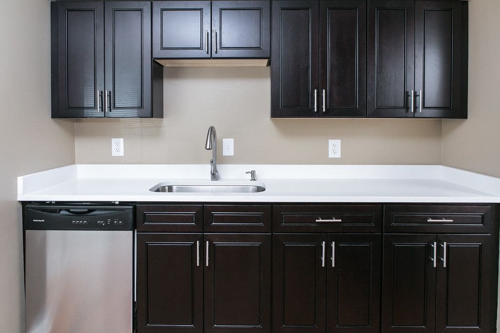 Espresso & Quartz Kitchen Remodel — Karma Construction Group