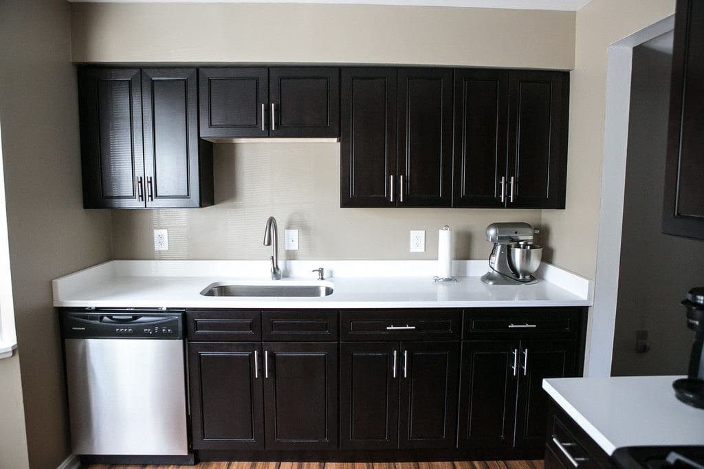 Espresso & Quartz Kitchen Remodel — Karma Construction Group