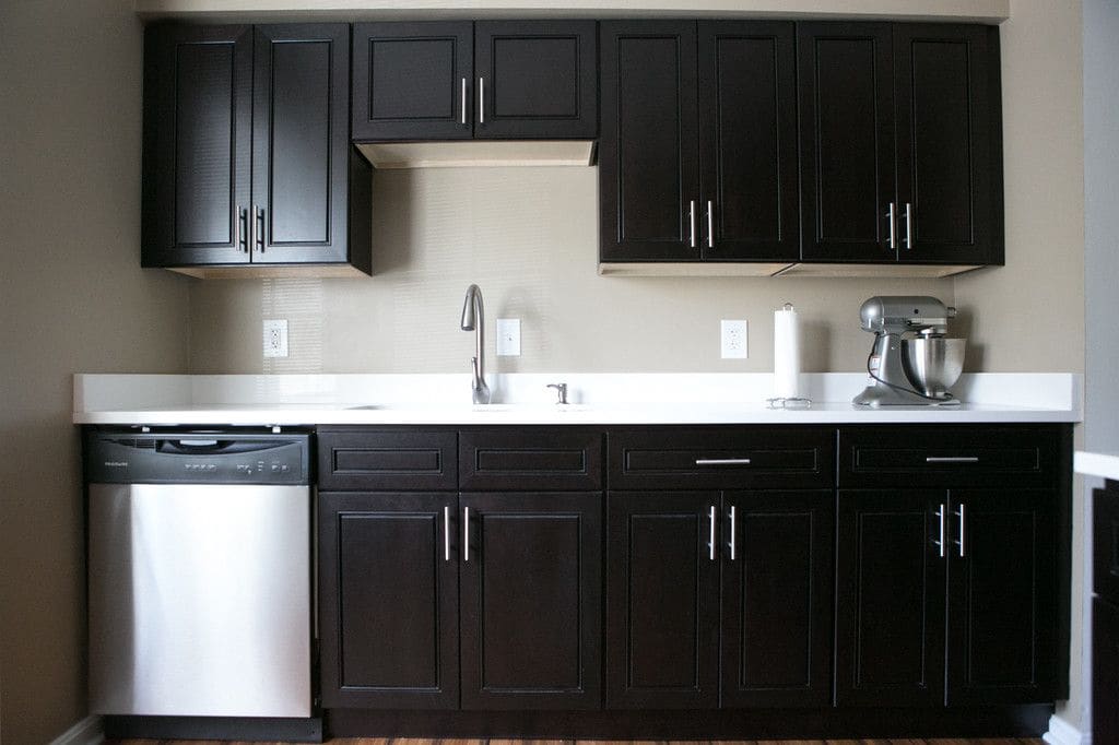 Espresso & Quartz Kitchen Remodel — Karma Construction Group