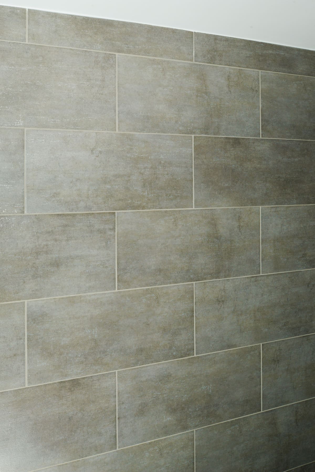Gray Stone Walk-In Shower Bathroom — Karma Construction Group