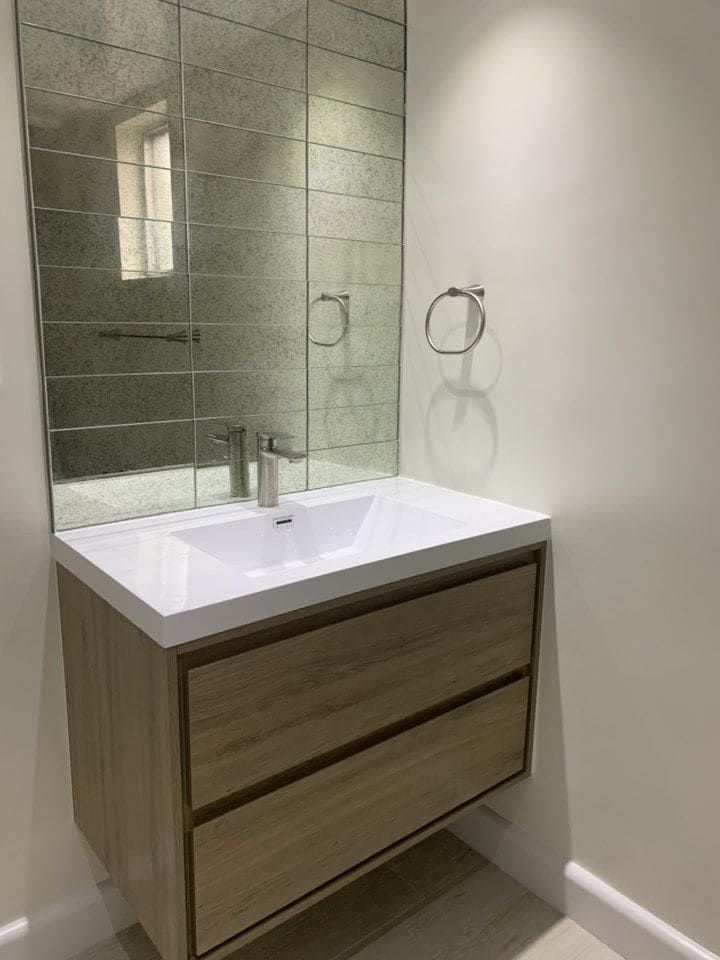 Modern Guest Bathroom Remodel — Karma Construction Group